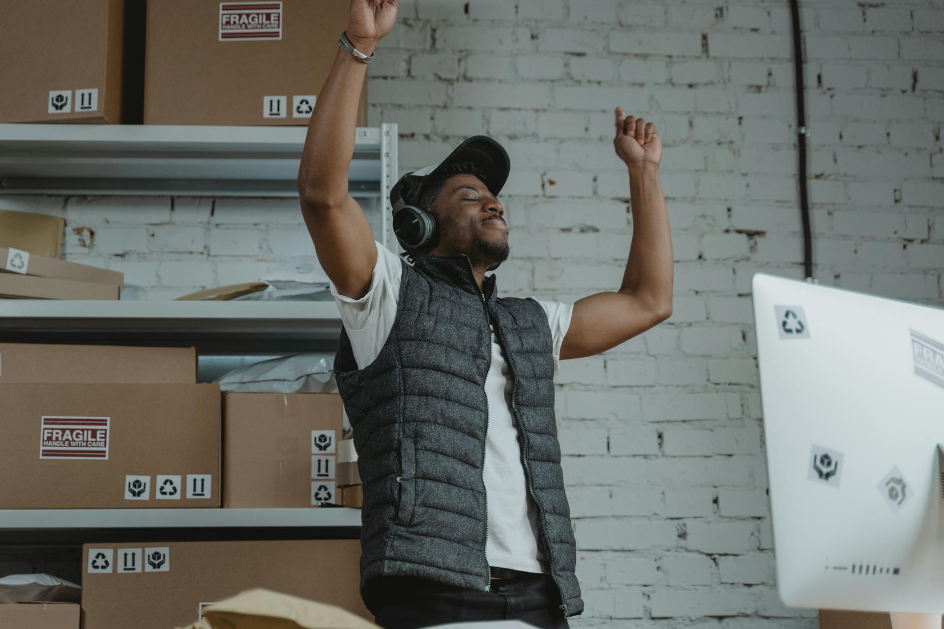 Man rejoicing aout new software interface on his computer